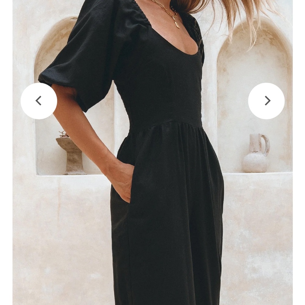 Black Puff Sleeve black jumpsuit romper size small retails $189!!!!